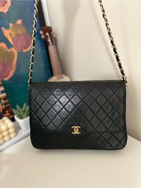 CHANEL Black Quilted Shoulder Bag with Gold Hardware - No serial
